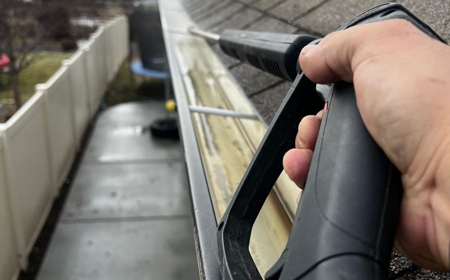 Cleaning a residential roof gutter