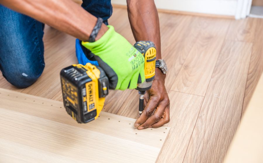 Handyman drilling with a cordless drill