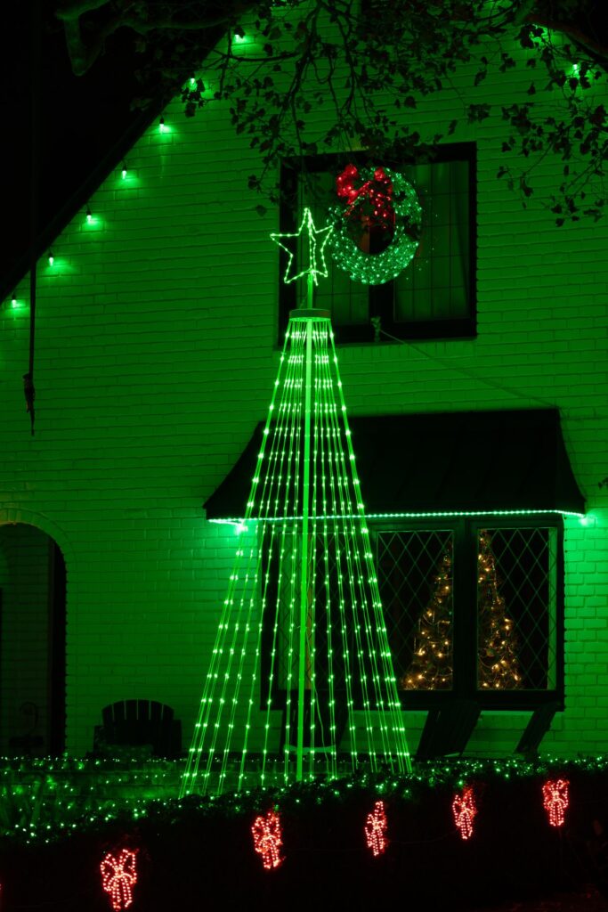 House decorated with Christmas lights at night