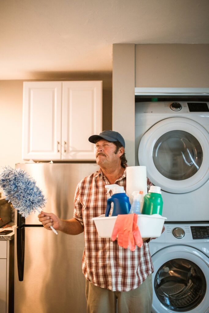 Cleaning around a home laundry dryer