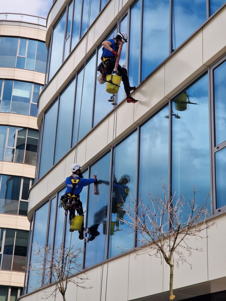 Window cleaner working on exterior glass