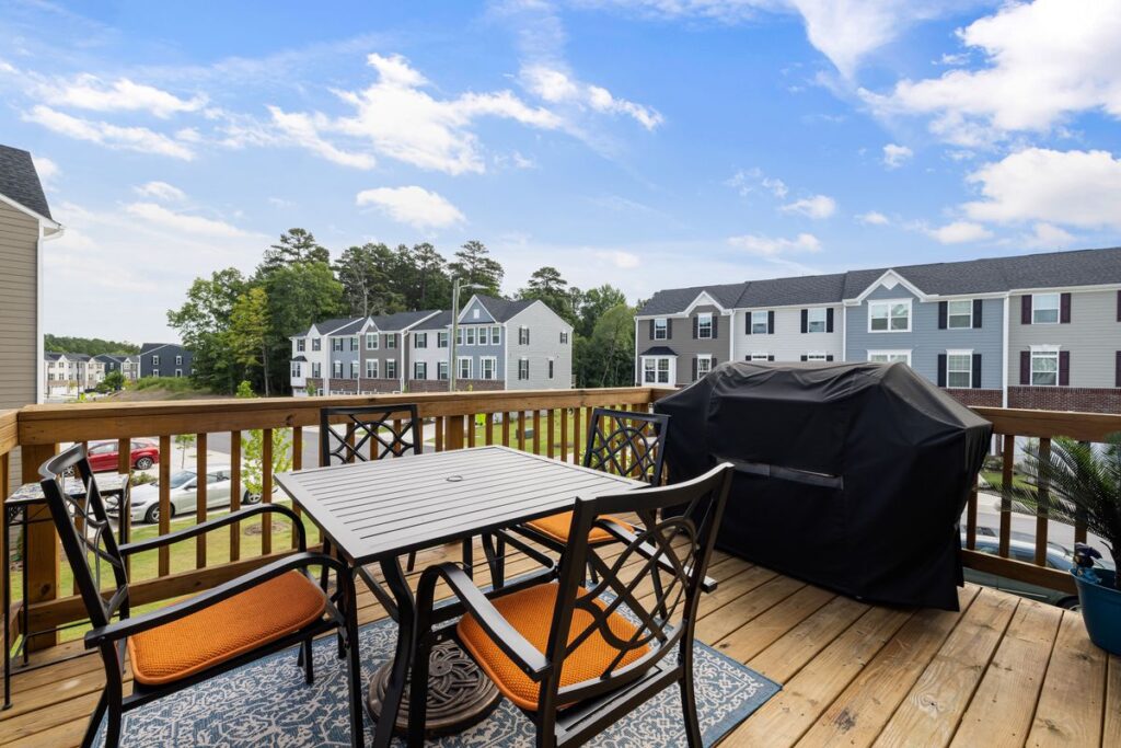 Wooden backyard deck with furniture